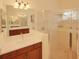 Bathroom with shower, tub, and double vanity at 12338 Lavender Loop, Bradenton, FL 34212