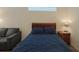 Bedroom with a sleigh bed and sitting area at 12338 Lavender Loop, Bradenton, FL 34212