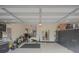 Large garage with ample storage and room for workshop or gym at 12338 Lavender Loop, Bradenton, FL 34212