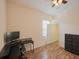 Home office with wood floors and desk at 12338 Lavender Loop, Bradenton, FL 34212