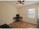 Home office with wood floors, desk and couch at 12338 Lavender Loop, Bradenton, FL 34212
