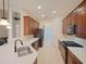 Modern kitchen with stainless steel appliances at 12338 Lavender Loop, Bradenton, FL 34212