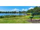 Relaxing lake view with bench seating at 12338 Lavender Loop, Bradenton, FL 34212