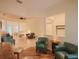Living area with seating and view to bar area at 12338 Lavender Loop, Bradenton, FL 34212