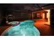 Relaxing pool and spa at night with outdoor lighting at 12338 Lavender Loop, Bradenton, FL 34212