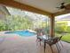 Inviting pool and spa with spacious screened patio and dining area at 12338 Lavender Loop, Bradenton, FL 34212