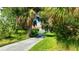 Curving walkway through lush landscaping at 12338 Lavender Loop, Bradenton, FL 34212