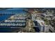 An aerial view of a waterfront marina adjacent to commercial and residential properties at 1600 1St W Ave # 304A, Bradenton, FL 34205