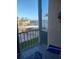 Waterfront balcony view featuring waterfront views, tropical vegetation, and pool views at 1600 1St W Ave # 304A, Bradenton, FL 34205