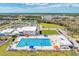 Aerial view of community pool and surrounding neighborhood at 16257 S Port Harbor Blvd, Port Charlotte, FL 33953