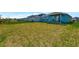 Large backyard with grassy area at 16257 S Port Harbor Blvd, Port Charlotte, FL 33953