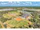 Aerial view of four well-maintained baseball fields at 16257 S Port Harbor Blvd, Port Charlotte, FL 33953