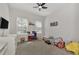 Charming bedroom with a playful theme, featuring a bed and toy storage at 16257 S Port Harbor Blvd, Port Charlotte, FL 33953
