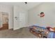 bedroom with twin bed, closet, and playful wall decor at 16257 S Port Harbor Blvd, Port Charlotte, FL 33953