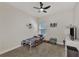 bedroom with a twin bed, toy storage, and TV at 16257 S Port Harbor Blvd, Port Charlotte, FL 33953