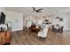 Open concept kitchen, dining, and living area with hardwood floors at 16257 S Port Harbor Blvd, Port Charlotte, FL 33953
