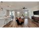 Open concept living room and kitchen with hardwood floors at 16257 S Port Harbor Blvd, Port Charlotte, FL 33953