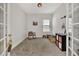 Bright and spacious playroom with French doors and a rocking chair at 16257 S Port Harbor Blvd, Port Charlotte, FL 33953