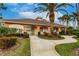 Community center with walkway and lush landscaping at 2224 Lynx Run, North Port, FL 34288