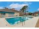 Inviting community pool with plenty of seating at 2224 Lynx Run, North Port, FL 34288