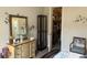 Bedroom with dresser, large closet, and chair at 2536 Marton Oak Blvd, North Port, FL 34289