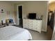 Large bedroom with walk-in closet and ensuite bathroom access at 2536 Marton Oak Blvd, North Port, FL 34289