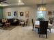 Open dining area with table and chairs, adjacent to living room at 2536 Marton Oak Blvd, North Port, FL 34289