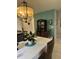 Bright dining room with a charming hutch and seating for six at 2536 Marton Oak Blvd, North Port, FL 34289