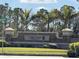 Community entrance sign for Cedar Grove at the Woodlands at 2536 Marton Oak Blvd, North Port, FL 34289