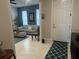 View from entryway to living room with tiled floors at 2536 Marton Oak Blvd, North Port, FL 34289