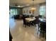 Open living room with a large sectional sofa and water views at 2536 Marton Oak Blvd, North Port, FL 34289