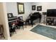 Elegant music room with grand piano and keyboard at 2536 Marton Oak Blvd, North Port, FL 34289