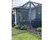 Spacious screened patio, great for outdoor dining and grilling at 2536 Marton Oak Blvd, North Port, FL 34289