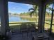 Enjoy tranquil lake views from this screened porch at 2536 Marton Oak Blvd, North Port, FL 34289