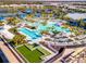Resort-style pool, tennis, pickleball courts, and expansive community at 25917 Bimini Sands Ct, Englewood, FL 34223
