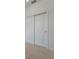 White sliding door closet with two panels at 25917 Bimini Sands Ct, Englewood, FL 34223