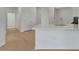 White quartz kitchen island with a clean minimalist design at 25917 Bimini Sands Ct, Englewood, FL 34223