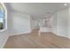 Light and airy living room with hardwood floors and open concept layout at 25917 Bimini Sands Ct, Englewood, FL 34223