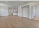 Bright living room with hardwood floors and an open floor plan at 25917 Bimini Sands Ct, Englewood, FL 34223