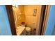 Small second bathroom with toilet and sink vanity at 289 Bainbridge Dr, Nokomis, FL 34275