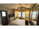 Main bedroom with a double bed, mirrored closet and ample natural light at 289 Bainbridge Dr, Nokomis, FL 34275