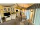 Cozy kitchen with light wood cabinets and an eat-in dining area at 289 Bainbridge Dr, Nokomis, FL 34275