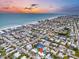 Aerial view of beach town home with pool, close to the beach at 306 66Th St, Holmes Beach, FL 34217