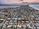 Aerial view showing home's location near the beach and bay at 306 66Th St, Holmes Beach, FL 34217