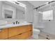 Modern bathroom with a floating vanity and walk-in shower at 306 66Th St, Holmes Beach, FL 34217