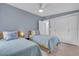 Guest bedroom with two twin beds and built-in closet at 306 66Th St, Holmes Beach, FL 34217