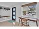 Entryway with built-in bench, storage, and desk at 306 66Th St, Holmes Beach, FL 34217