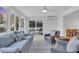 Gathering room with sliding doors leading to the pool at 306 66Th St, Holmes Beach, FL 34217