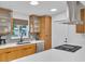 Modern kitchen with stainless steel appliances and a window at 306 66Th St, Holmes Beach, FL 34217