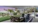 Relaxing screened porch overlooking the backyard and pool at 306 66Th St, Holmes Beach, FL 34217